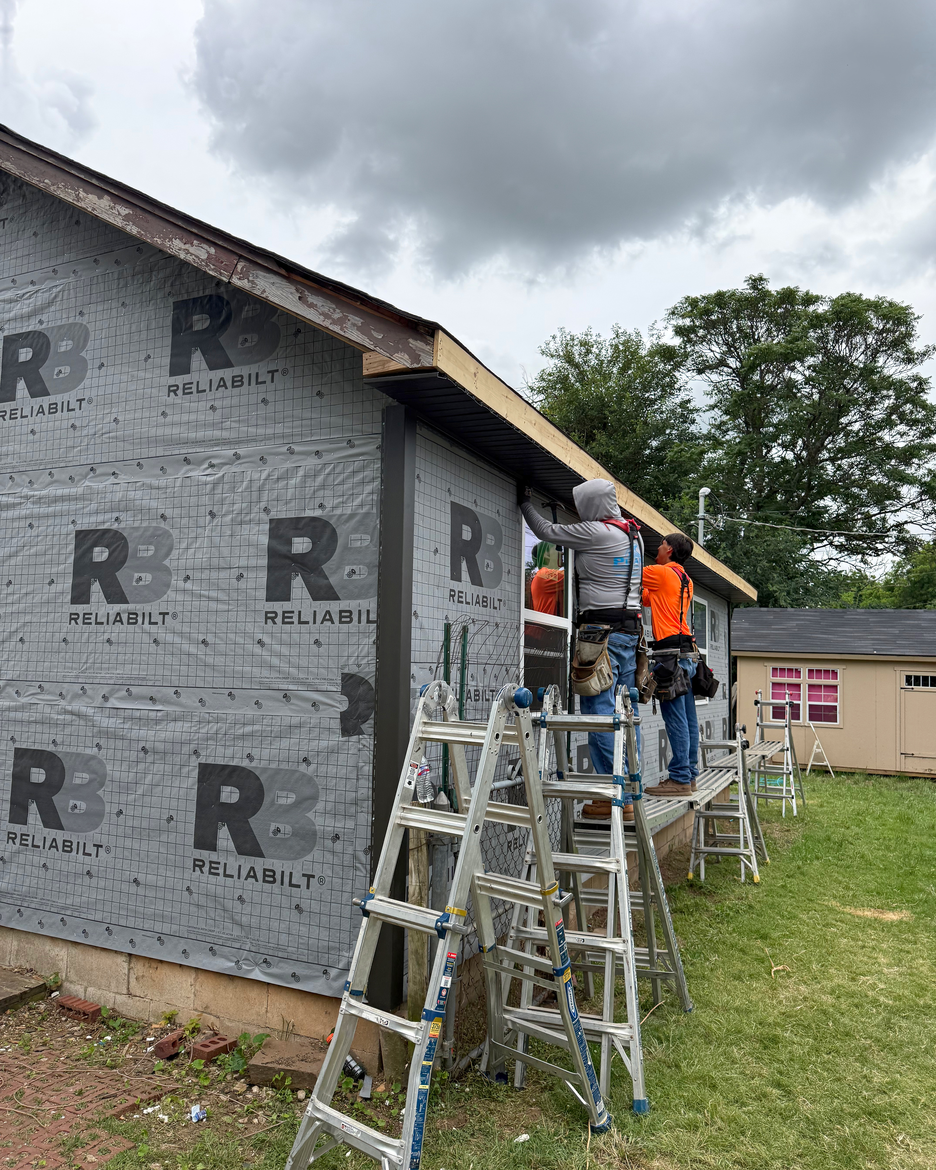 Triple C Improvements crew completing soffit and fascia work